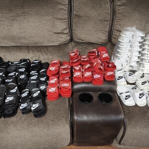 76 pair of Kids slides range size range from 22 to 35.  see conversion chart NEW